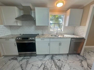 Lot Rent $1342.00 Monthly  Total square footage under A/C is on Del Tura Golf and Country Club in Florida - for sale on GolfHomes.com, golf home, golf lot