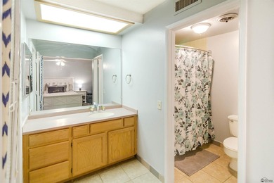 Enjoy easy, low-maintenance living in this spacious two-story on Yuma Golf and Country Club in Arizona - for sale on GolfHomes.com, golf home, golf lot