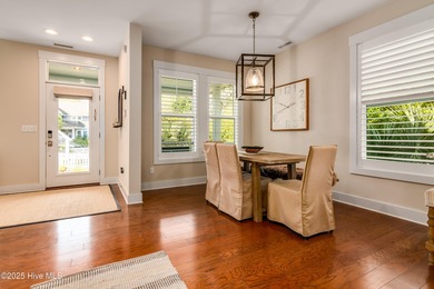 Exuding curb appeal, this four-bedroom, 3.5-bath 2017-built home on Bald Head Island Golf Club in North Carolina - for sale on GolfHomes.com, golf home, golf lot