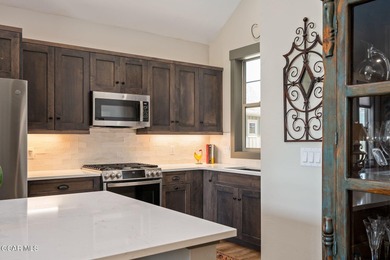 Enjoy the best of mountain living in this townhome located in on Grand Elk Ranch and Club in Colorado - for sale on GolfHomes.com, golf home, golf lot