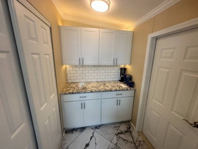 Lot Rent $1342.00 Monthly  Total square footage under A/C is on Del Tura Golf and Country Club in Florida - for sale on GolfHomes.com, golf home, golf lot