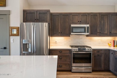 Enjoy the best of mountain living in this townhome located in on Grand Elk Ranch and Club in Colorado - for sale on GolfHomes.com, golf home, golf lot