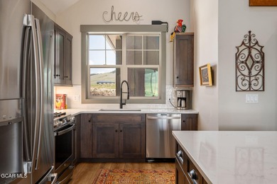 Enjoy the best of mountain living in this townhome located in on Grand Elk Ranch and Club in Colorado - for sale on GolfHomes.com, golf home, golf lot