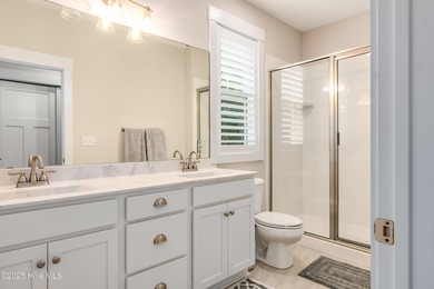 Exuding curb appeal, this four-bedroom, 3.5-bath 2017-built home on Bald Head Island Golf Club in North Carolina - for sale on GolfHomes.com, golf home, golf lot