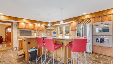 Stunning home and property on just under 4 acres outside of an on Buck Hill Golf Club  in Pennsylvania - for sale on GolfHomes.com, golf home, golf lot