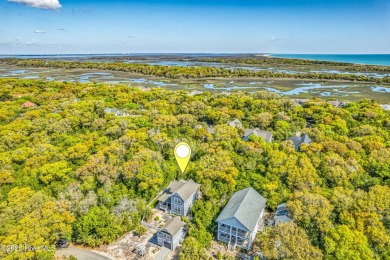 Exuding curb appeal, this four-bedroom, 3.5-bath 2017-built home on Bald Head Island Golf Club in North Carolina - for sale on GolfHomes.com, golf home, golf lot