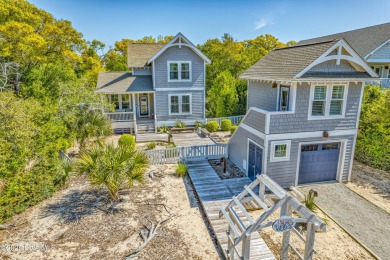 Exuding curb appeal, this four-bedroom, 3.5-bath 2017-built home on Bald Head Island Golf Club in North Carolina - for sale on GolfHomes.com, golf home, golf lot