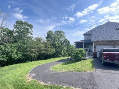 LAKE FRONT Stately Brick Colonial with 1st Floor Master. Five on Old Bridge Golf Club in Kentucky - for sale on GolfHomes.com, golf home, golf lot