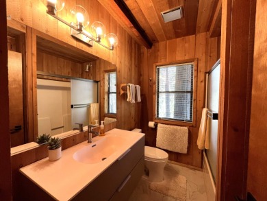 Welcome to your dream mountain escape! This stunning three-level on Lake Almanor West Golf Course in California - for sale on GolfHomes.com, golf home, golf lot