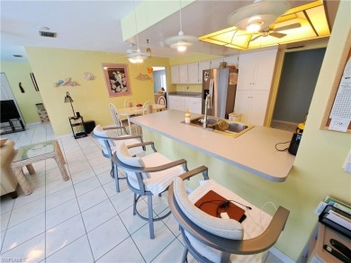 This spacious 2,133 square foot pool home sits on a corner lot on El Rio Golf Course and Club in Florida - for sale on GolfHomes.com, golf home, golf lot