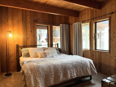 Welcome to your dream mountain escape! This stunning three-level on Lake Almanor West Golf Course in California - for sale on GolfHomes.com, golf home, golf lot