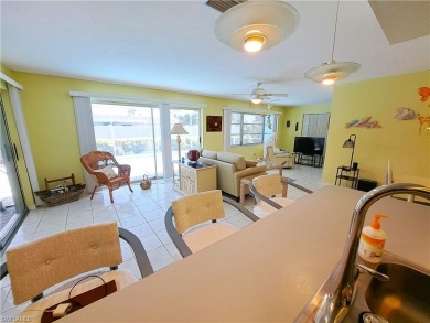 This spacious 2,133 square foot pool home sits on a corner lot on El Rio Golf Course and Club in Florida - for sale on GolfHomes.com, golf home, golf lot