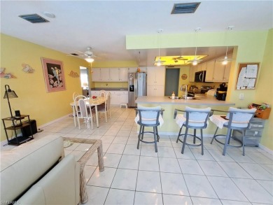 This spacious 2,133 square foot pool home sits on a corner lot on El Rio Golf Course and Club in Florida - for sale on GolfHomes.com, golf home, golf lot