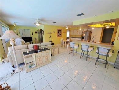 This spacious 2,133 square foot pool home sits on a corner lot on El Rio Golf Course and Club in Florida - for sale on GolfHomes.com, golf home, golf lot