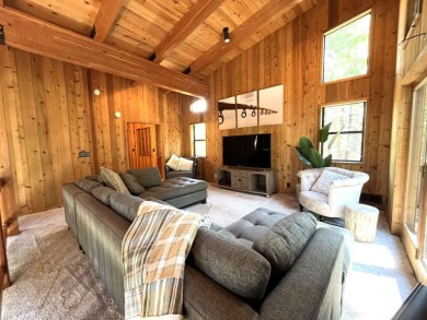Welcome to your dream mountain escape! This stunning three-level on Lake Almanor West Golf Course in California - for sale on GolfHomes.com, golf home, golf lot