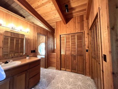 Welcome to your dream mountain escape! This stunning three-level on Lake Almanor West Golf Course in California - for sale on GolfHomes.com, golf home, golf lot