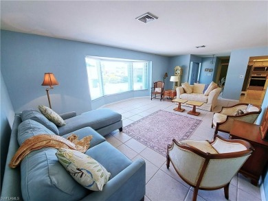 This spacious 2,133 square foot pool home sits on a corner lot on El Rio Golf Course and Club in Florida - for sale on GolfHomes.com, golf home, golf lot