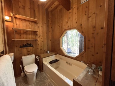 Welcome to your dream mountain escape! This stunning three-level on Lake Almanor West Golf Course in California - for sale on GolfHomes.com, golf home, golf lot