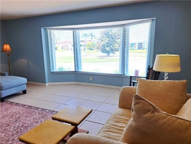 This spacious 2,133 square foot pool home sits on a corner lot on El Rio Golf Course and Club in Florida - for sale on GolfHomes.com, golf home, golf lot