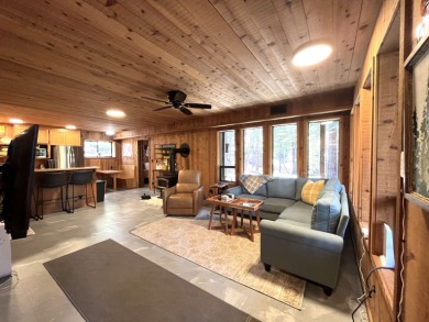 Welcome to your dream mountain escape! This stunning three-level on Lake Almanor West Golf Course in California - for sale on GolfHomes.com, golf home, golf lot