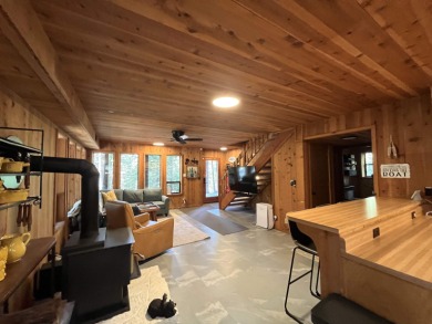 Welcome to your dream mountain escape! This stunning three-level on Lake Almanor West Golf Course in California - for sale on GolfHomes.com, golf home, golf lot