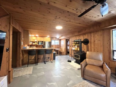 Welcome to your dream mountain escape! This stunning three-level on Lake Almanor West Golf Course in California - for sale on GolfHomes.com, golf home, golf lot