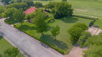 Spanish-style charm shines in this beautiful home set on an on Hillsboro Country Club in Texas - for sale on GolfHomes.com, golf home, golf lot