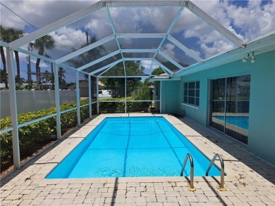 This spacious 2,133 square foot pool home sits on a corner lot on El Rio Golf Course and Club in Florida - for sale on GolfHomes.com, golf home, golf lot