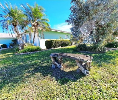 This spacious 2,133 square foot pool home sits on a corner lot on El Rio Golf Course and Club in Florida - for sale on GolfHomes.com, golf home, golf lot