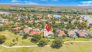 Luxury living awaits in this stunning one-story pool home on the on Weston Hills Country Club in Florida - for sale on GolfHomes.com, golf home, golf lot