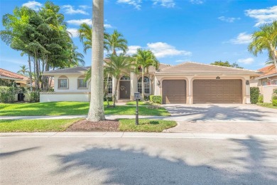 Luxury living awaits in this stunning one-story pool home on the on Weston Hills Country Club in Florida - for sale on GolfHomes.com, golf home, golf lot