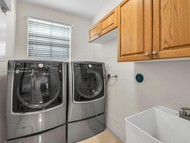 INCREDIBLE BACKYARD, FULLY RENOVATED HOME W/ STUNNING VIEWS on Weston Hills Country Club in Florida - for sale on GolfHomes.com, golf home, golf lot