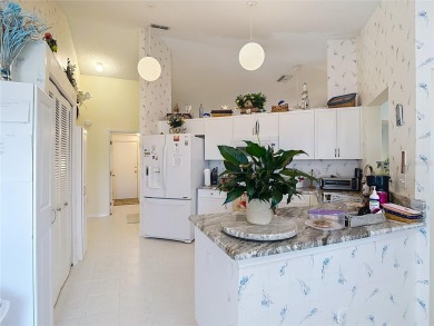 ### Charming Two-Suite Home in a Vibrant 55+ Community - Move-In on Caloosa Greens Executive Golf Course in Florida - for sale on GolfHomes.com, golf home, golf lot