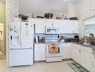 ### Charming Two-Suite Home in a Vibrant 55+ Community - Move-In on Caloosa Greens Executive Golf Course in Florida - for sale on GolfHomes.com, golf home, golf lot
