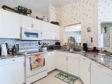 ### Charming Two-Suite Home in a Vibrant 55+ Community - Move-In on Caloosa Greens Executive Golf Course in Florida - for sale on GolfHomes.com, golf home, golf lot