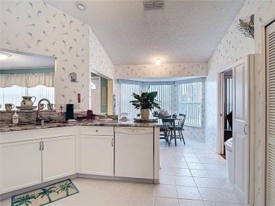 ### Charming Two-Suite Home in a Vibrant 55+ Community - Move-In on Caloosa Greens Executive Golf Course in Florida - for sale on GolfHomes.com, golf home, golf lot