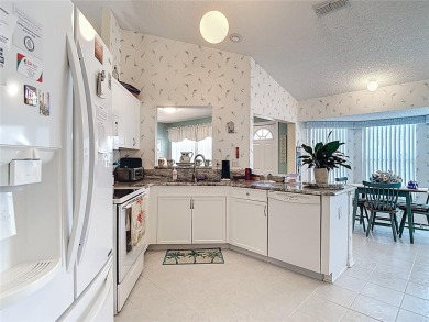 ### Charming Two-Suite Home in a Vibrant 55+ Community - Move-In on Caloosa Greens Executive Golf Course in Florida - for sale on GolfHomes.com, golf home, golf lot