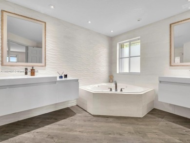 INCREDIBLE BACKYARD, FULLY RENOVATED HOME W/ STUNNING VIEWS on Weston Hills Country Club in Florida - for sale on GolfHomes.com, golf home, golf lot