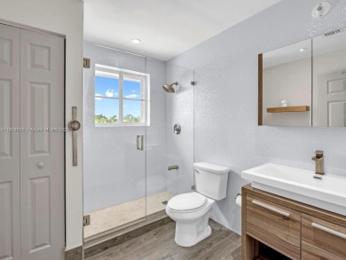 INCREDIBLE BACKYARD, FULLY RENOVATED HOME W/ STUNNING VIEWS on Weston Hills Country Club in Florida - for sale on GolfHomes.com, golf home, golf lot