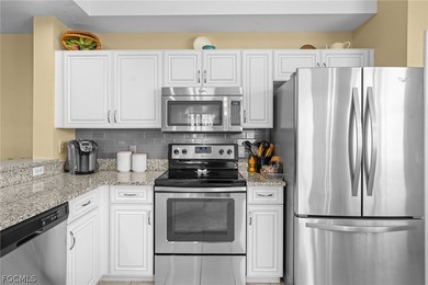 Impeccable first floor golf membership Carlisle condominium in on Legends Golf and Country Club in Florida - for sale on GolfHomes.com, golf home, golf lot