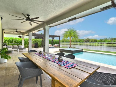 INCREDIBLE BACKYARD, FULLY RENOVATED HOME W/ STUNNING VIEWS on Weston Hills Country Club in Florida - for sale on GolfHomes.com, golf home, golf lot