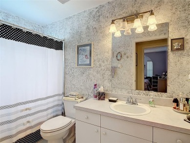 ### Charming Two-Suite Home in a Vibrant 55+ Community - Move-In on Caloosa Greens Executive Golf Course in Florida - for sale on GolfHomes.com, golf home, golf lot