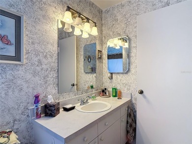 ### Charming Two-Suite Home in a Vibrant 55+ Community - Move-In on Caloosa Greens Executive Golf Course in Florida - for sale on GolfHomes.com, golf home, golf lot