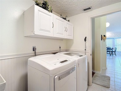 ### Charming Two-Suite Home in a Vibrant 55+ Community - Move-In on Caloosa Greens Executive Golf Course in Florida - for sale on GolfHomes.com, golf home, golf lot