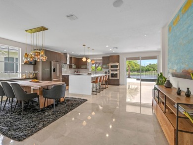 INCREDIBLE BACKYARD, FULLY RENOVATED HOME W/ STUNNING VIEWS on Weston Hills Country Club in Florida - for sale on GolfHomes.com, golf home, golf lot