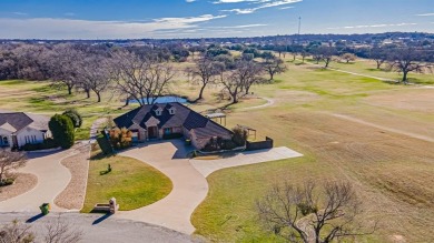 This three bedroom, two bathroom, large three car garage is on Granbury Country Club in Texas - for sale on GolfHomes.com, golf home, golf lot