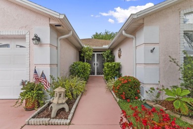Luxuriously upgraded 3-bed, 2-bath lakefront home with over 1 on Spanish Lakes Fairways in Florida - for sale on GolfHomes.com, golf home, golf lot