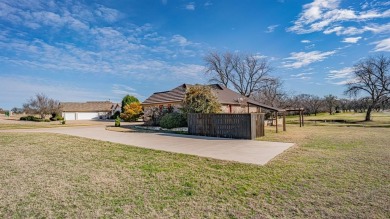 This three bedroom, two bathroom, large three car garage is on Granbury Country Club in Texas - for sale on GolfHomes.com, golf home, golf lot