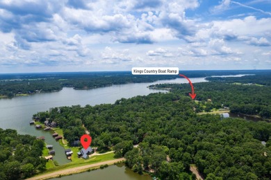 Welcome to 109 King Shore Blvd, a luxury waterfront retreat in on Cypress Creek Country Club in Texas - for sale on GolfHomes.com, golf home, golf lot