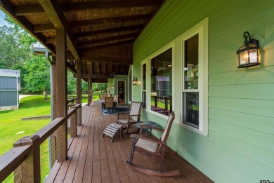 Welcome to 109 King Shore Blvd, a luxury waterfront retreat in on Cypress Creek Country Club in Texas - for sale on GolfHomes.com, golf home, golf lot